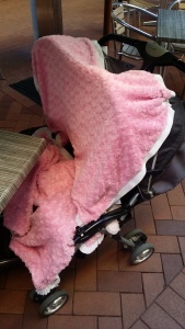 Cover the stroller with blanket to create privacy