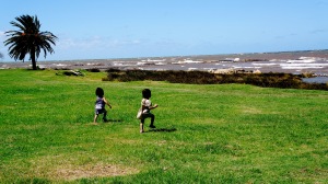 The twins stretch their legs at Pocitos, Montevideo, Uruguay